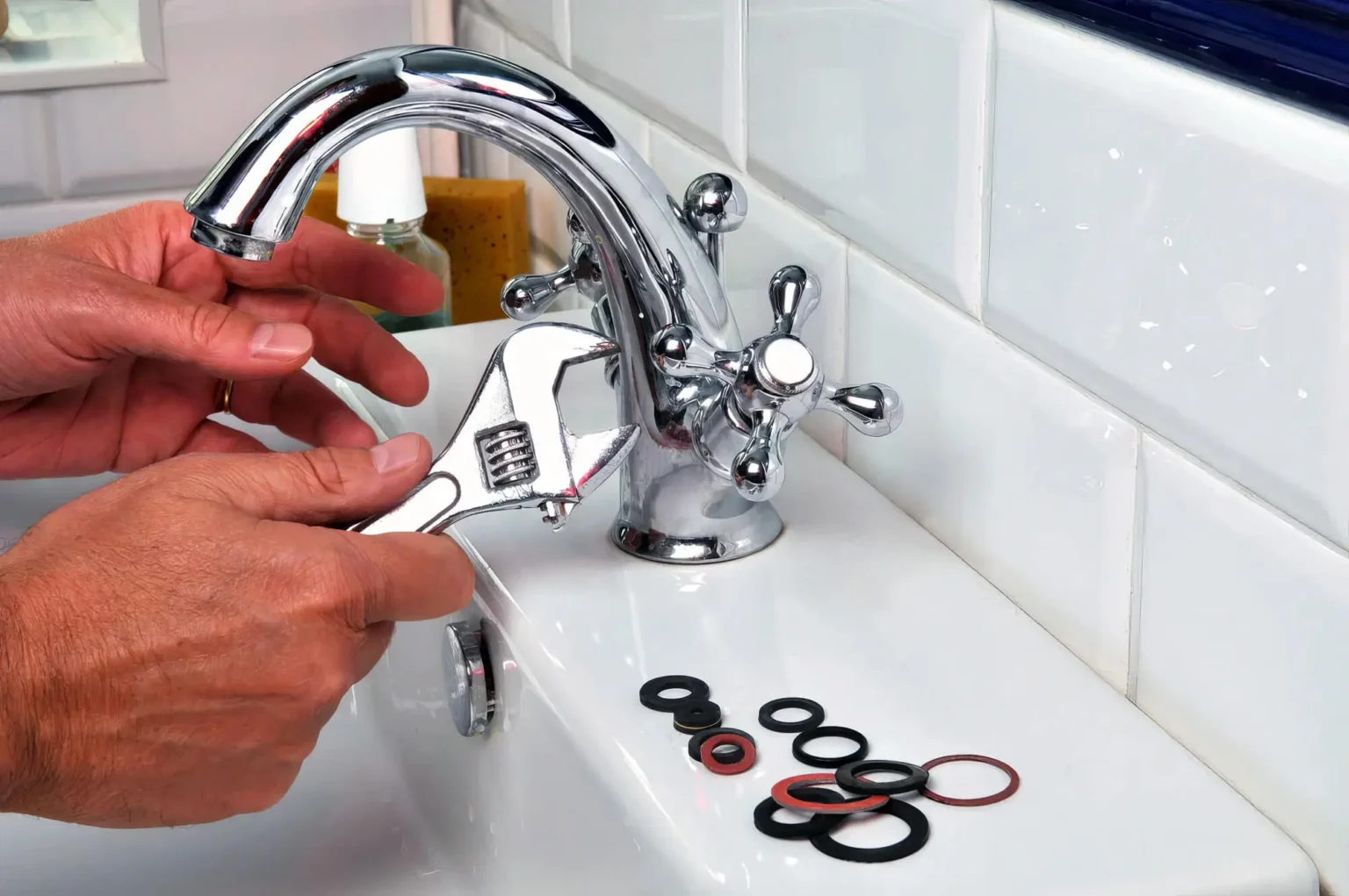 Plumber maintaining a bathroom faucet in Daly City