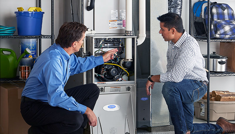 Technician evaluating a furnace for repair or replacement in Daly City